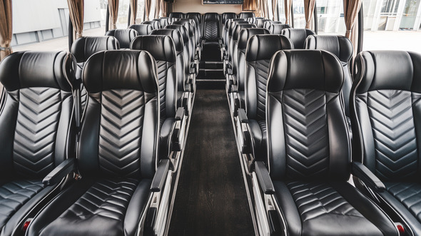 54 passenger charter bus inside akron