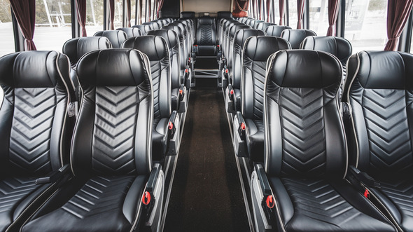 56 passenger charter bus inside akron