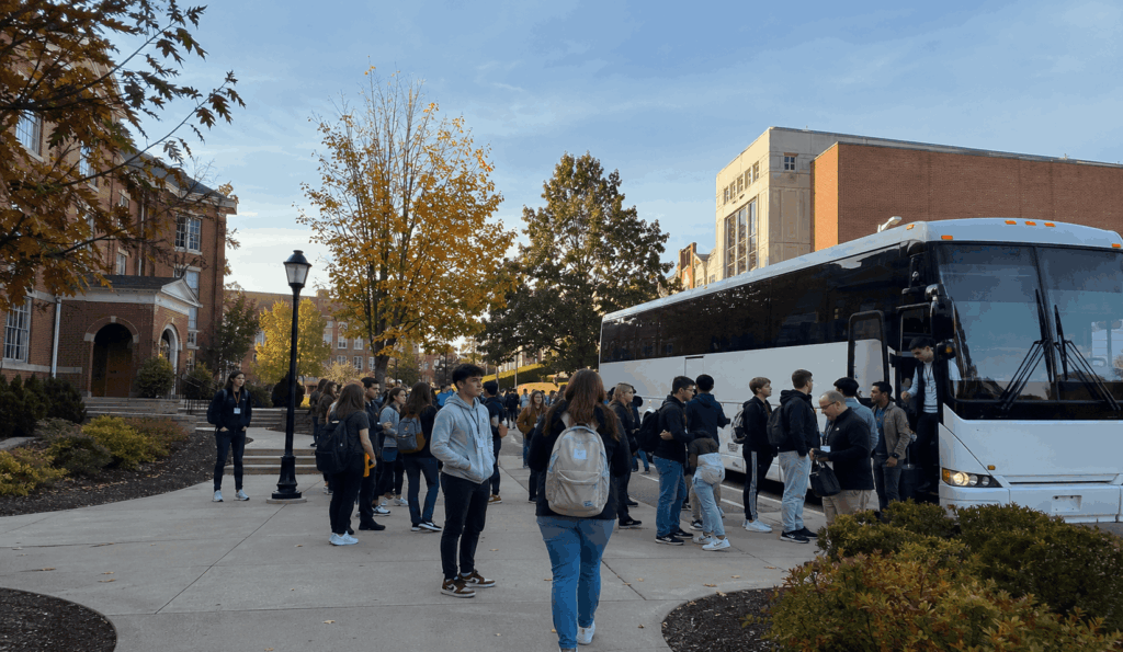 charter bus arriving with high school students for a college campus visit near akron, ohio