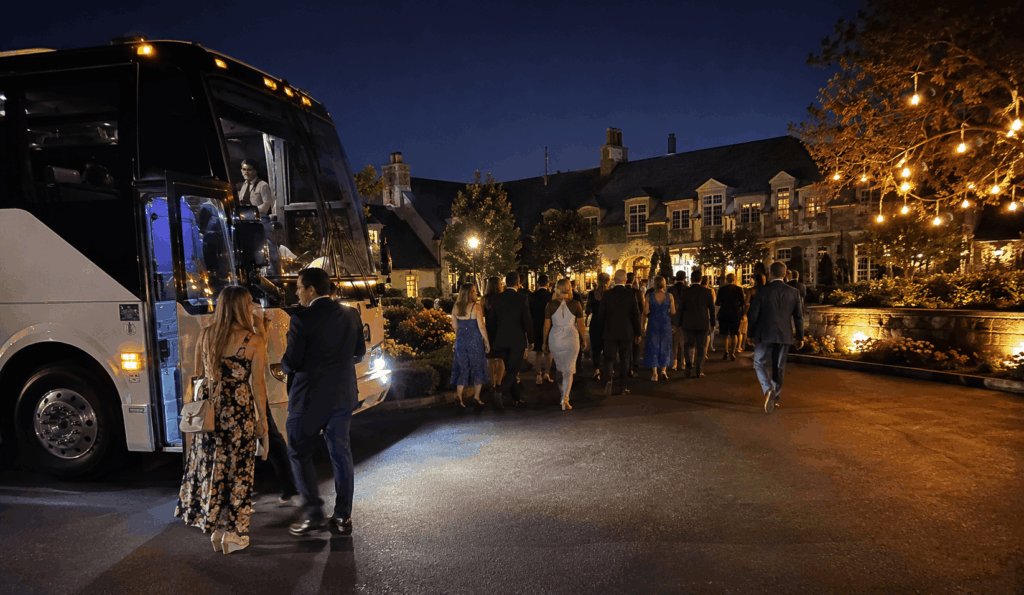 charter bus waiting outside an akron wedding reception venue to transport guests back to their hotel