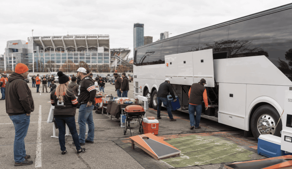 browns fans boarding a charter bus after a game near huntington bank field in cleveland