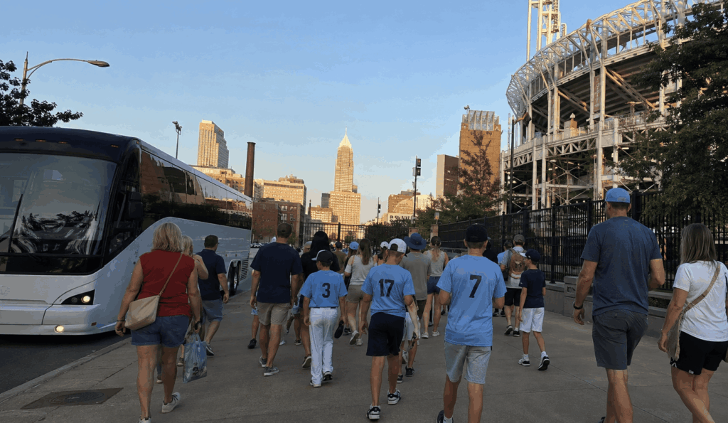 charter bus dropping off a group outside progressive field before a cleveland guardians game