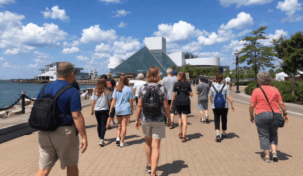 charter bus waiting near cleveland's lakefront attractions during a group outing